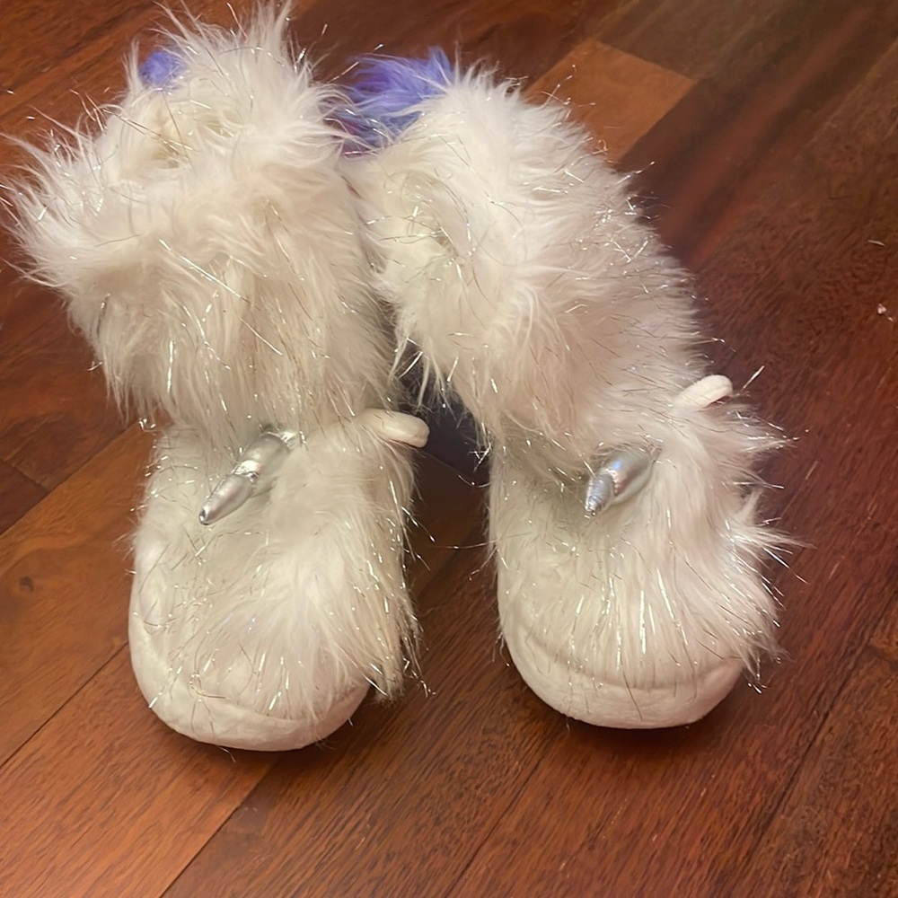 i am selling a bear of fuzzy boots for girls who love unicorns!!
